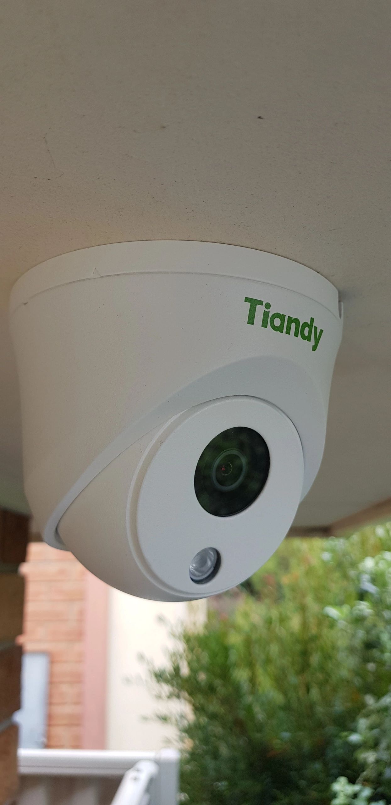 Tiandy dome CCTV camera mounted under eave